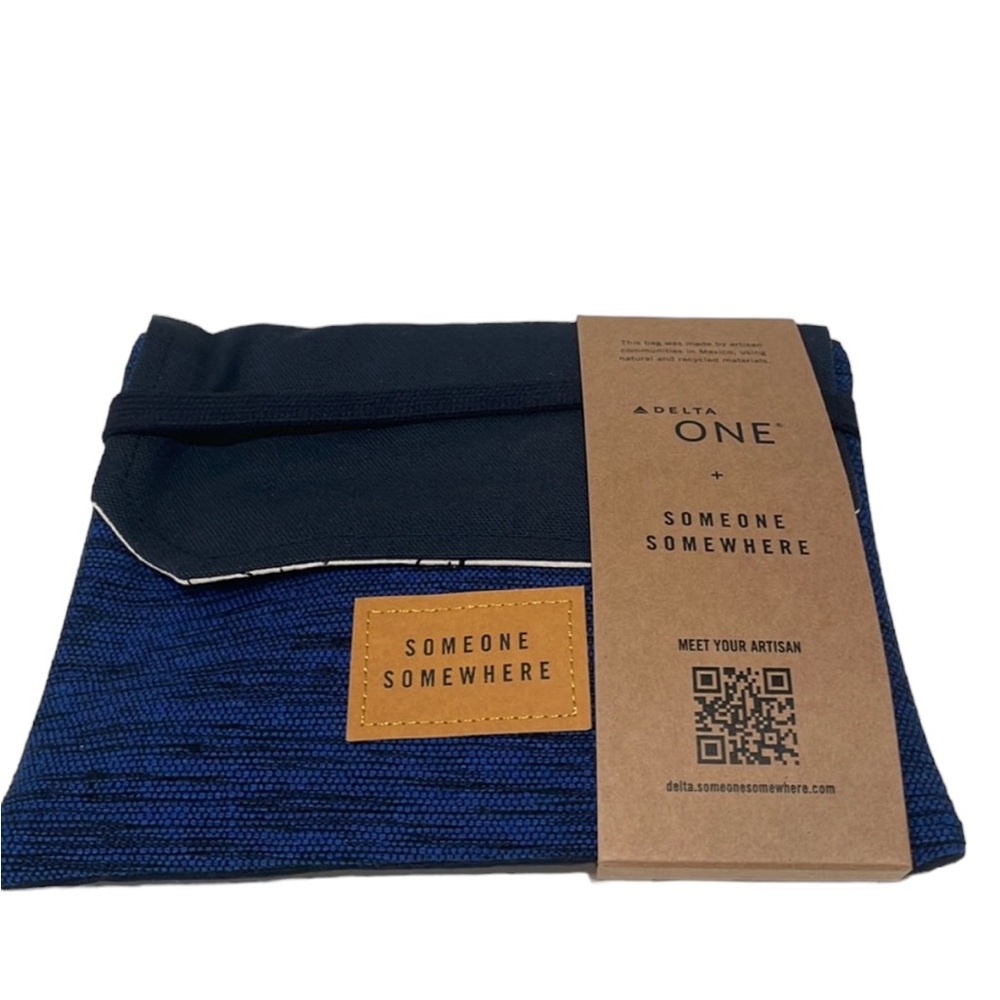 Delta One Someone Somewhere Artisan-Made Amenity Kit. Royal Blue. NWT